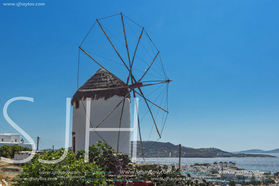 Panorama of white windmill and island of Mykonos, Cyclades, Greece