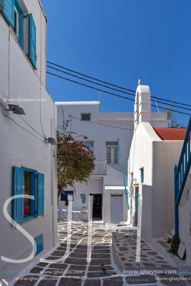 Street with white houses in town of Mykonos, Cyclades Islands, Greece