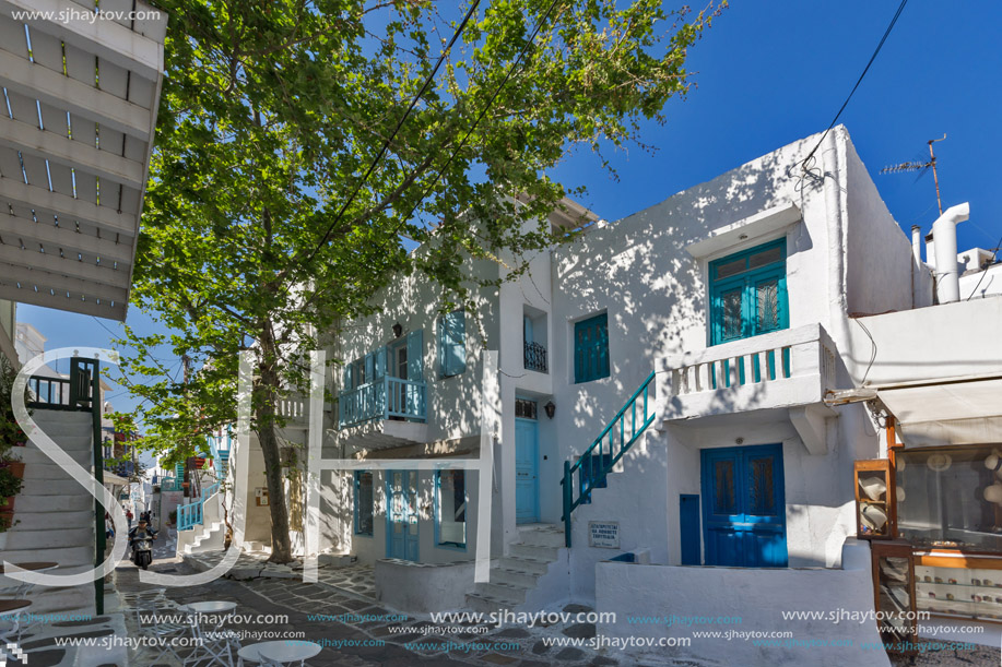 Street with white houses in town of Mykonos, Cyclades Islands, Greece