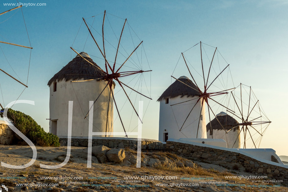 Amazing Sunset and White windmills on the island of Mykonos, Cyclades, Greece