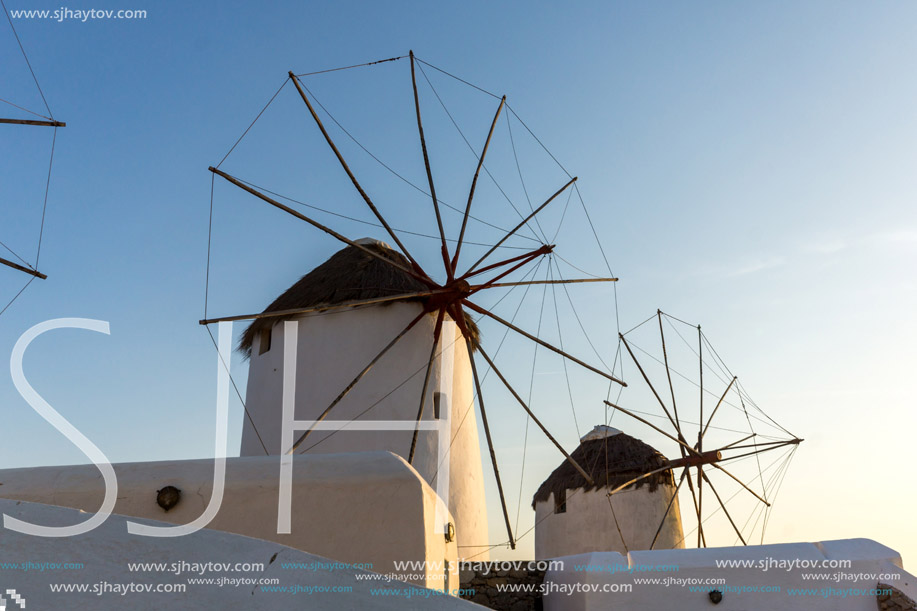 Amazing Sunset and White windmills on the island of Mykonos, Cyclades, Greece