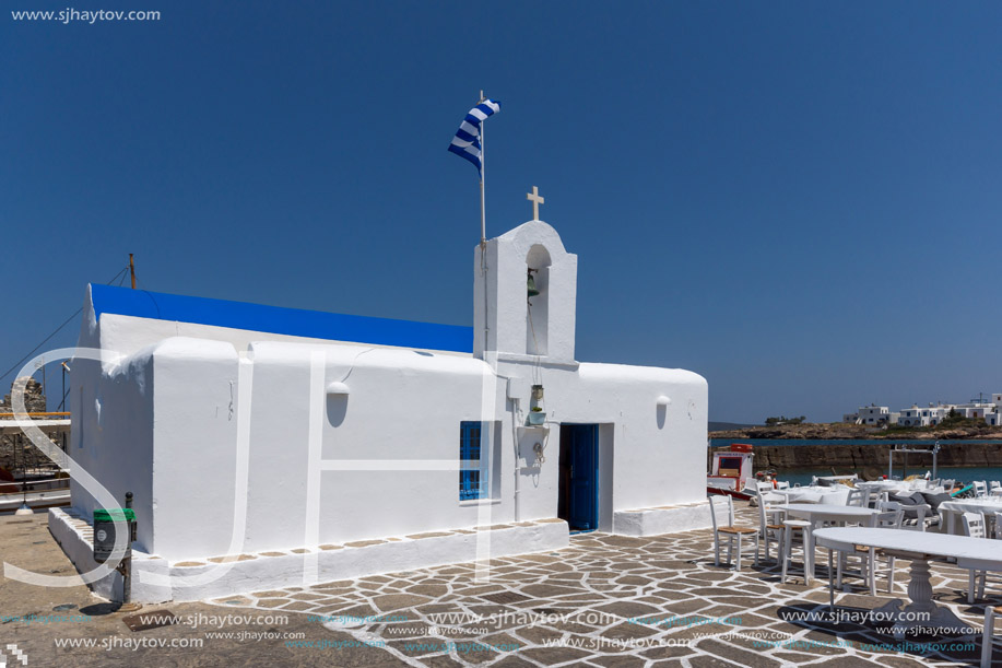 White church in town of Naoussa, Paros island, Cyclades, Greece