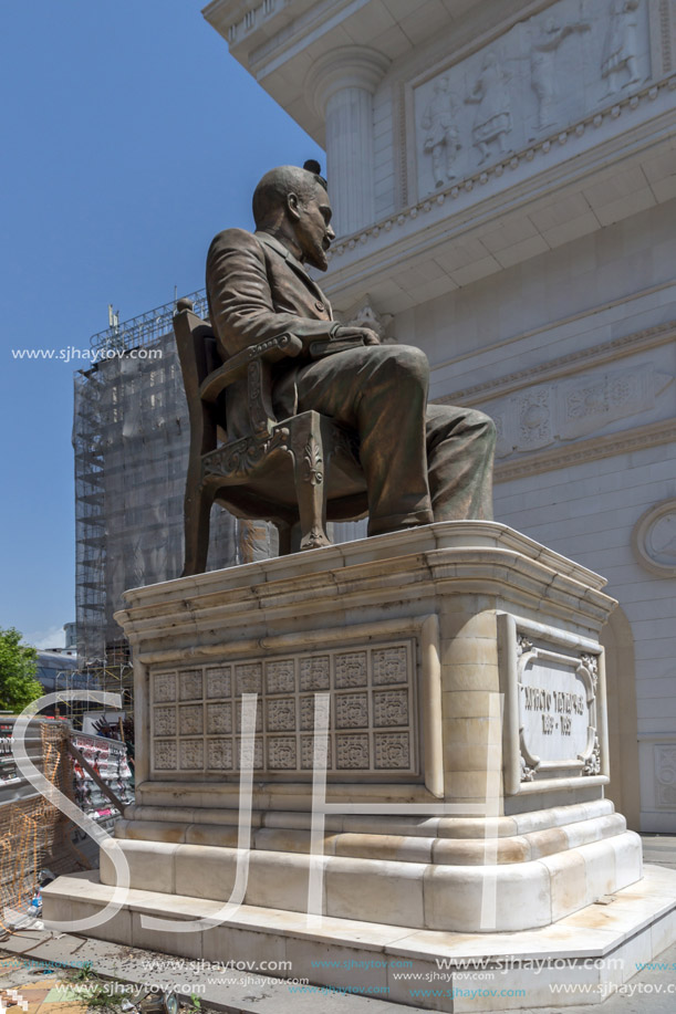 SKOPJE, REPUBLIC OF MACEDONIA - 13 MAY 2017: Hristo Tatarchev Monument and Macedonia Gate arch, Skopje, Macedonia