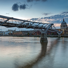 LONDON, ENGLAND - JUNE 17 2016: Night photo of Thames River,  Millennium Bridge and  St. Paul Cathedral, London, Great Britain
