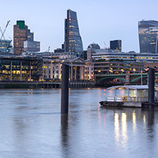 LONDON, ENGLAND - JUNE 17 2016: Night Photo of Thames River and skyscrapers, London, Great Britain