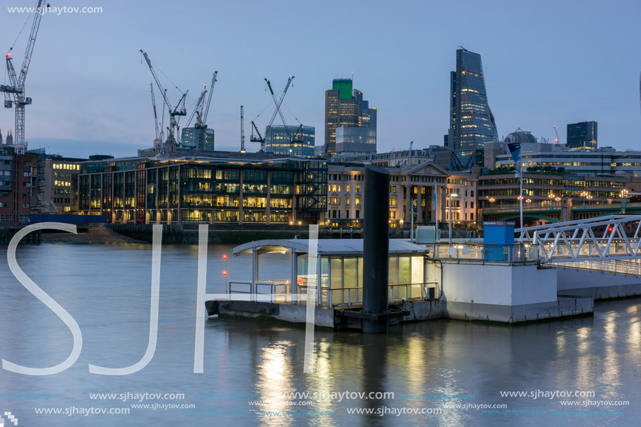 LONDON, ENGLAND - JUNE 17 2016: Night Photo of Thames River and skyscrapers, London, Great Britain