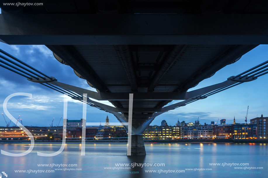 LONDON, ENGLAND - JUNE 17 2016: Night photo of Thames River,  Millennium Bridge and  St. Paul Cathedral, London, Great Britain