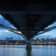 LONDON, ENGLAND - JUNE 17 2016: Night photo of Thames River,  Millennium Bridge and  St. Paul Cathedral, London, Great Britain