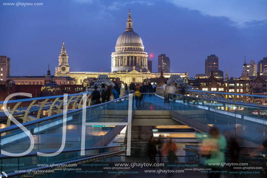 LONDON, ENGLAND - JUNE 17 2016: Night photo of Thames River,  Millennium Bridge and  St. Paul Cathedral, London, Great Britain