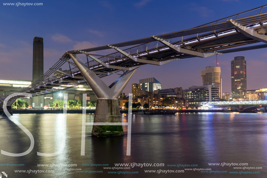 LONDON, ENGLAND - JUNE 17 2016: Night Panorama of Millennium Bridge, Tate Modern Gallery and Thames River, London, United Kingdom