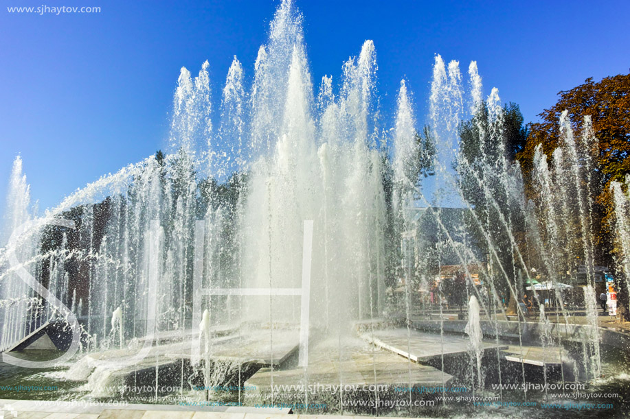 PLEVEN, BULGARIA - 20 SEPTEMBER 2015: Town hall and fountain in center of city of Pleven, Bulgaria