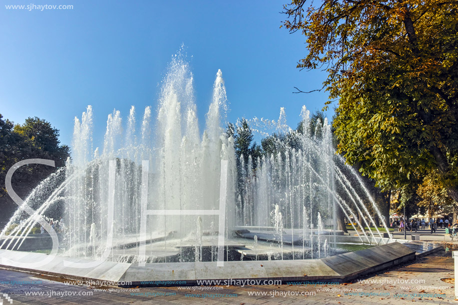 PLEVEN, BULGARIA - 20 SEPTEMBER 2015: Town hall and fountain in center of city of Pleven, Bulgaria