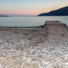 Amazing sunset on the beach of village of Vasiliki, Lefkada, Ionian Islands, Greece