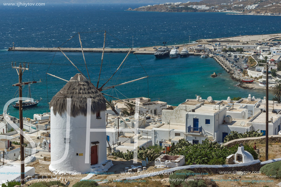 Panoramic view of white windmill and island of Mykonos, Cyclades, Greece