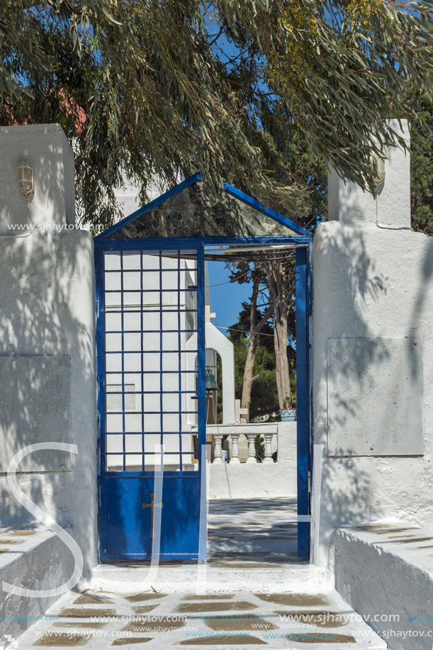 Street with white houses in town of Mykonos, Cyclades Islands, Greece