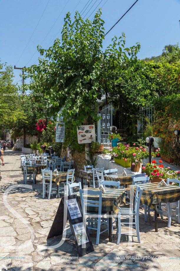 AGIOS NIKITAS, LEFKADA, GREECE JULY 16, 2014: Traditional houses in village of Agios Nikitas, Lefkada, Ionian Islands, Greece