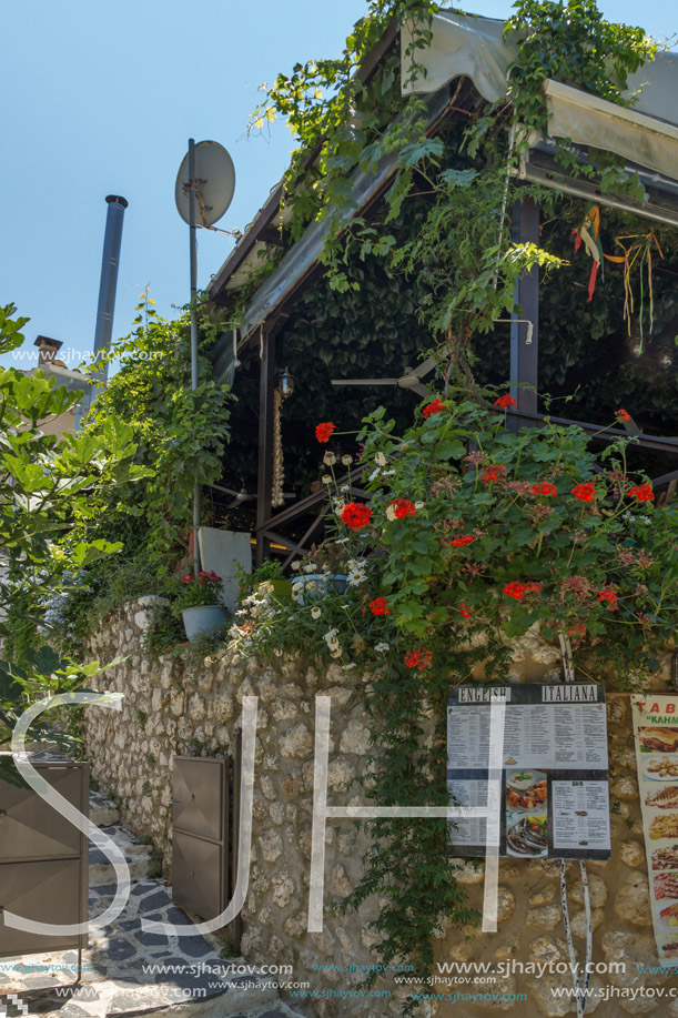 AGIOS NIKITAS, LEFKADA, GREECE JULY 16, 2014: Traditional houses in village of Agios Nikitas, Lefkada, Ionian Islands, Greece