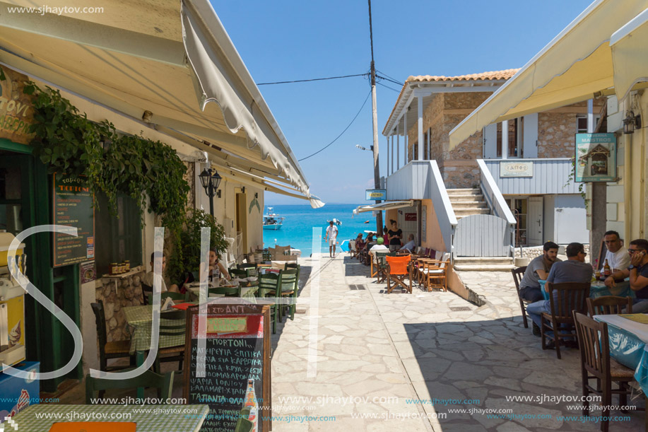 AGIOS NIKITAS, LEFKADA, GREECE JULY 16, 2014: Traditional houses in village of Agios Nikitas, Lefkada, Ionian Islands, Greece