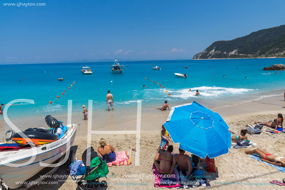 AGIOS NIKITAS, LEFKADA, GREECE JULY 16, 2014: Blue waters of beach of village of Agios Nikitas, Lefkada, Ionian Islands, Greece