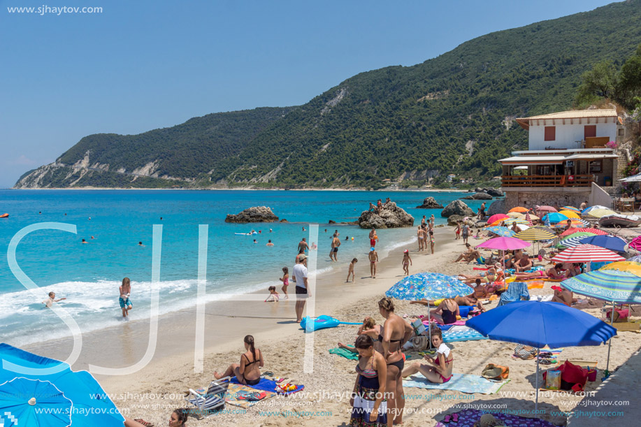 AGIOS NIKITAS, LEFKADA, GREECE JULY 16, 2014: Blue waters of beach of village of Agios Nikitas, Lefkada, Ionian Islands, Greece