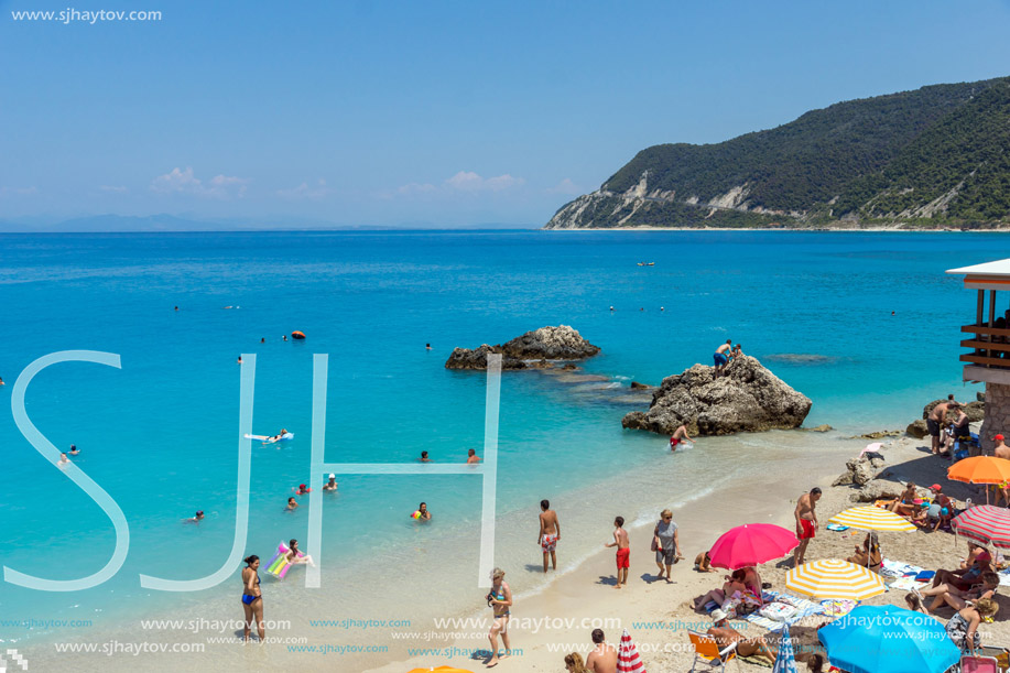 AGIOS NIKITAS, LEFKADA, GREECE JULY 16, 2014: Blue waters of beach of village of Agios Nikitas, Lefkada, Ionian Islands, Greece