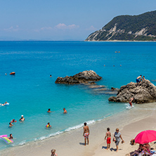 AGIOS NIKITAS, LEFKADA, GREECE JULY 16, 2014: Blue waters of beach of village of Agios Nikitas, Lefkada, Ionian Islands, Greece