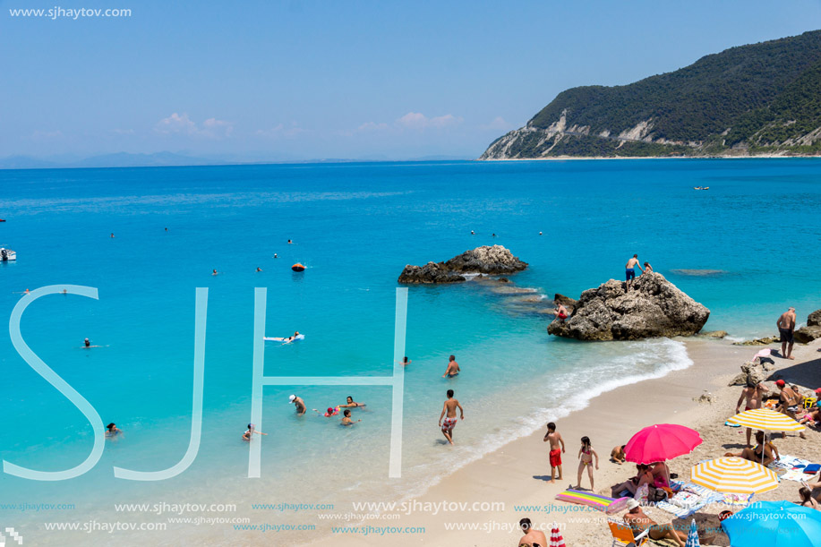 AGIOS NIKITAS, LEFKADA, GREECE JULY 16, 2014: Blue waters of beach of village of Agios Nikitas, Lefkada, Ionian Islands, Greece