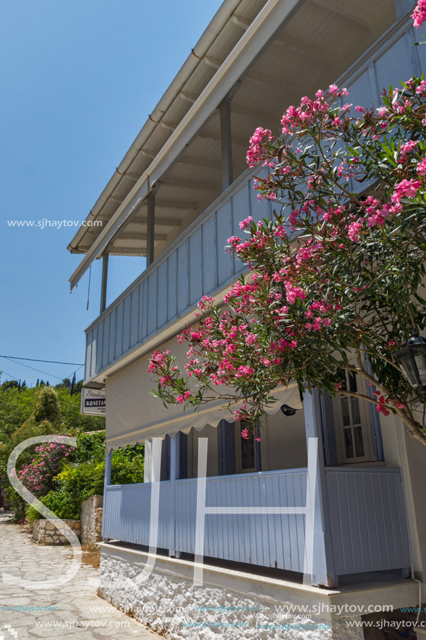 AGIOS NIKITAS, LEFKADA, GREECE JULY 16, 2014: Traditional houses in village of Agios Nikitas, Lefkada, Ionian Islands, Greece