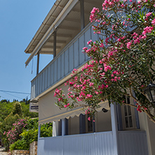 AGIOS NIKITAS, LEFKADA, GREECE JULY 16, 2014: Traditional houses in village of Agios Nikitas, Lefkada, Ionian Islands, Greece