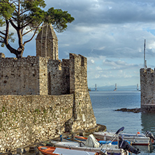 NAFPAKTOS, GREECE - MAY 28, 2015: Sunset panorama of Fortification at the port of Nafpaktos town, Western Greece