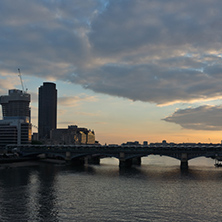 LONDON, ENGLAND - JUNE 18, 2016: Amazing sunset Cityscape from Millennium Bridge and Thames River, London, Great Britain