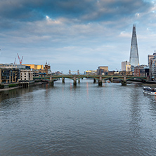 LONDON, ENGLAND - JUNE 18, 2016: Amazing sunset Cityscape from Millennium Bridge and Thames River, London, Great Britain
