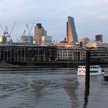 LONDON, ENGLAND - JUNE 18, 2016: Amazing sunset Cityscape from Millennium Bridge and Thames River, London, Great Britain