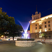 SOFIA, BULGARIA - JULY 21, 2017: Night photo of Fountain in front of The Building of the Presidency and Former Communist Party House in Sofia, Bulgaria