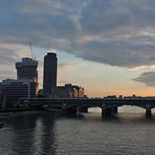 LONDON, ENGLAND - JUNE 18, 2016: Amazing sunset Cityscape from Millennium Bridge and Thames River, London, Great Britain
