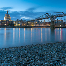 LONDON, ENGLAND - JUNE 18, 2016: Night photo of Millennium Bridge and  St. Paul Cathedral, London, Great Britain