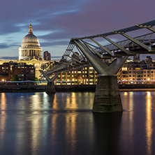 LONDON, ENGLAND - JUNE 18, 2016: Night photo of Millennium Bridge and  St. Paul Cathedral, London, Great Britain