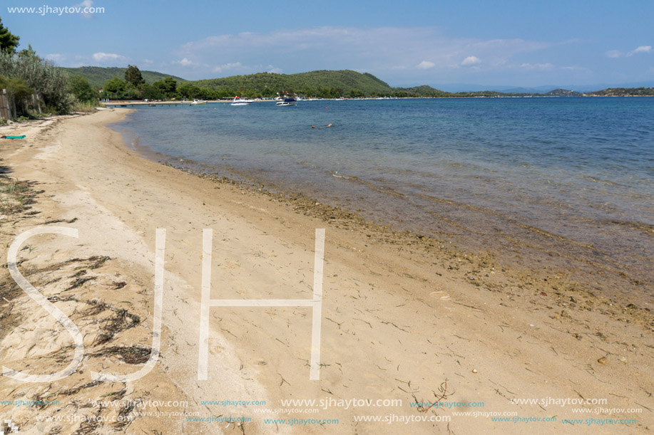 CHALKIDIKI, CENTRAL MACEDONIA, GREECE - AUGUST 26, 2014: Seascape of Beach of Vourvourou at Sithonia peninsula, Chalkidiki, Central Macedonia, Greece