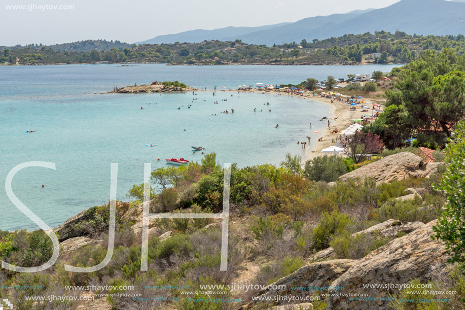 CHALKIDIKI, CENTRAL MACEDONIA, GREECE - AUGUST 26, 2014: Seascape of Lagonisi Beach at Sithonia peninsula, Chalkidiki, Central Macedonia, Greece