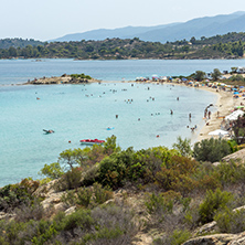 CHALKIDIKI, CENTRAL MACEDONIA, GREECE - AUGUST 26, 2014: Seascape of Lagonisi Beach at Sithonia peninsula, Chalkidiki, Central Macedonia, Greece