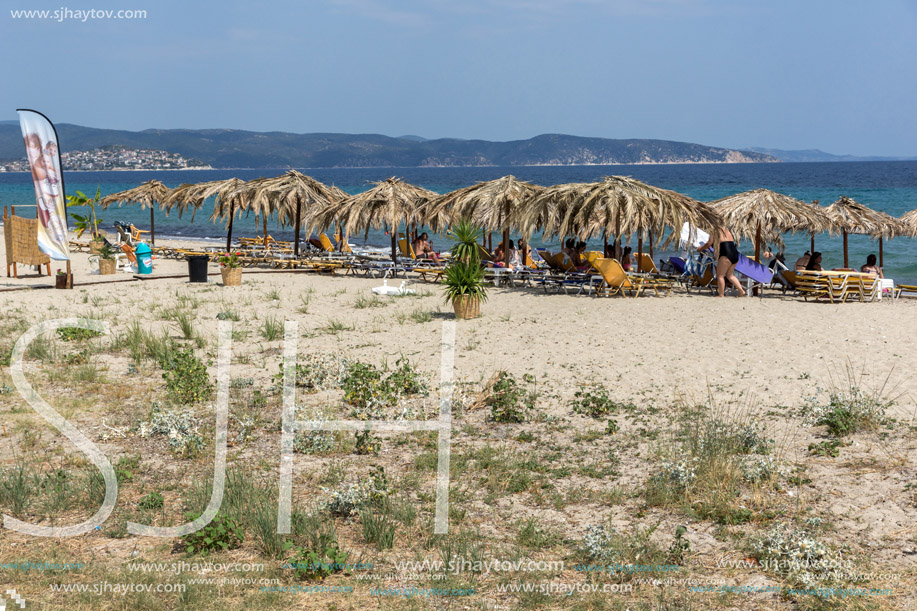 CHALKIDIKI, CENTRAL MACEDONIA, GREECE - AUGUST 26, 2014: Seascape of Assa Maris Beach Agios Nikolaos at Sithonia peninsula, Chalkidiki, Central Macedonia, Greece