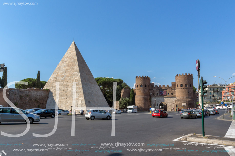 ROME, ITALY - JUNE 22, 2017: Amazing view of Pyramid of Caius Cestius and Porta St. Paolo in city of Rome, Italy