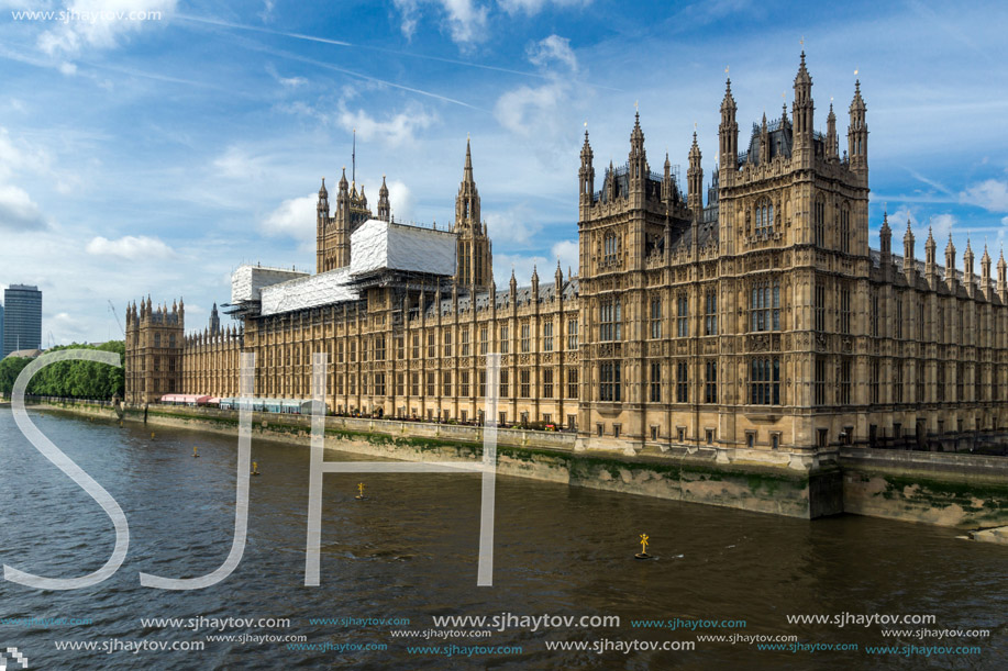 LONDON, ENGLAND - JUNE 19 2016: Cityscape of Westminster Palace and Thames River, London, England, United Kingdom