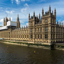 LONDON, ENGLAND - JUNE 19 2016: Cityscape of Westminster Palace and Thames River, London, England, United Kingdom