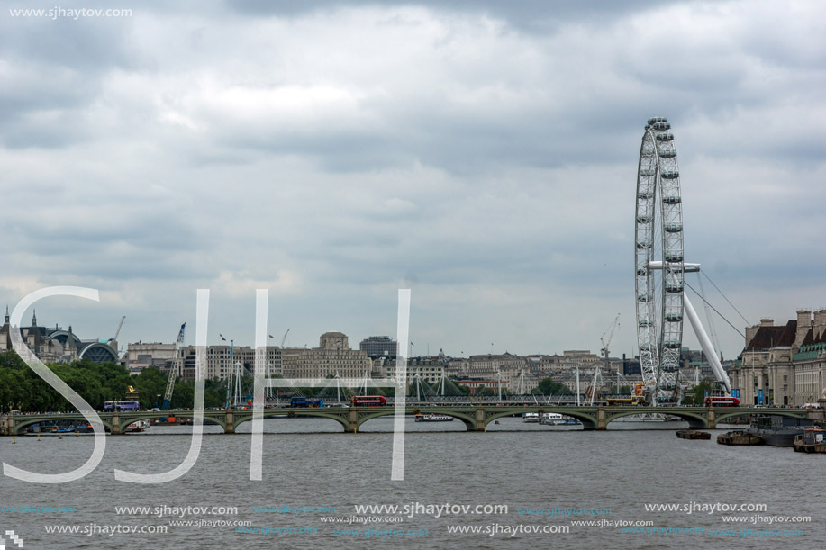 LONDON, ENGLAND - JUNE 19 2016: The London Eye on the South Bank of the River Thames in London, England, Great Britain
