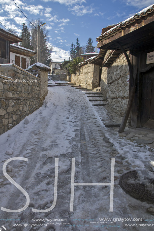 KOPRIVSHTITSA, BULGARIA - DECEMBER 13, 2013: Winter view of Street in historical town of Koprivshtitsa, Sofia Region, Bulgaria