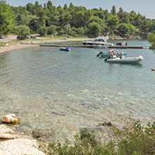 CHALKIDIKI, CENTRAL MACEDONIA, GREECE - AUGUST 25, 2014: Seascape of Spalathronisia beach at Sithonia peninsula, Chalkidiki, Central Macedonia, Greece