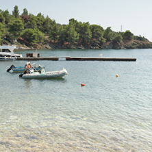 CHALKIDIKI, CENTRAL MACEDONIA, GREECE - AUGUST 25, 2014: Seascape of Spalathronisia beach at Sithonia peninsula, Chalkidiki, Central Macedonia, Greece