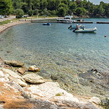 CHALKIDIKI, CENTRAL MACEDONIA, GREECE - AUGUST 25, 2014: Seascape of Spalathronisia beach at Sithonia peninsula, Chalkidiki, Central Macedonia, Greece