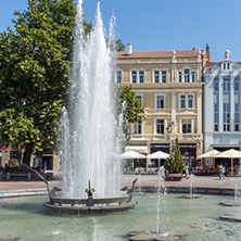 PLOVDIV, BULGARIA - SEPTEMBER 1, 2017:  Panoramic view of cental street and fountain in front of City hall in city of Plovdiv, Bulgaria